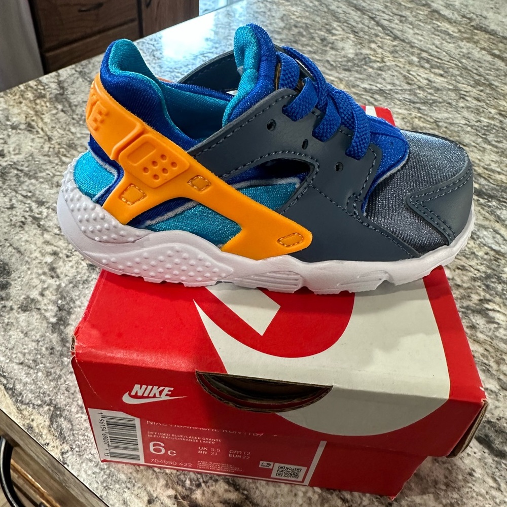 Nike Kids Sneakers in Blue, Orange, and Gray